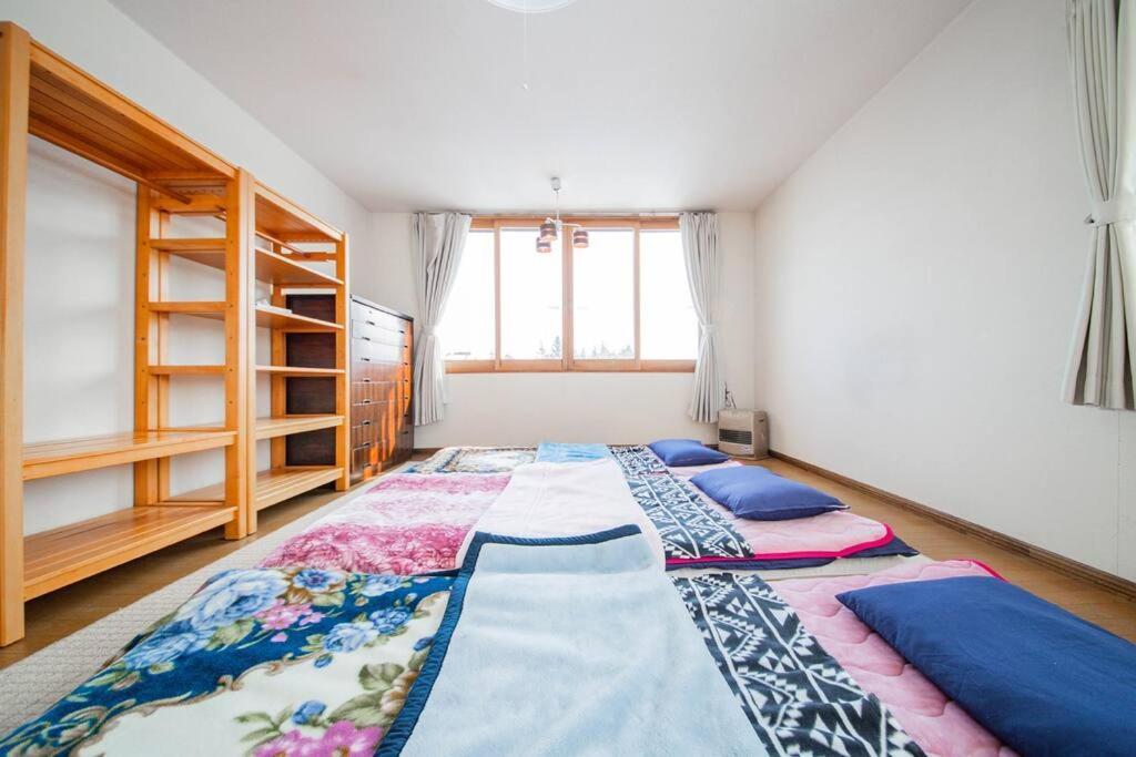 Guesthouse Chiyogaoka Асахикава Экстерьер фото
