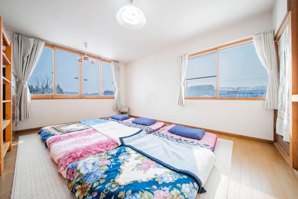 Guesthouse Chiyogaoka Асахикава Экстерьер фото