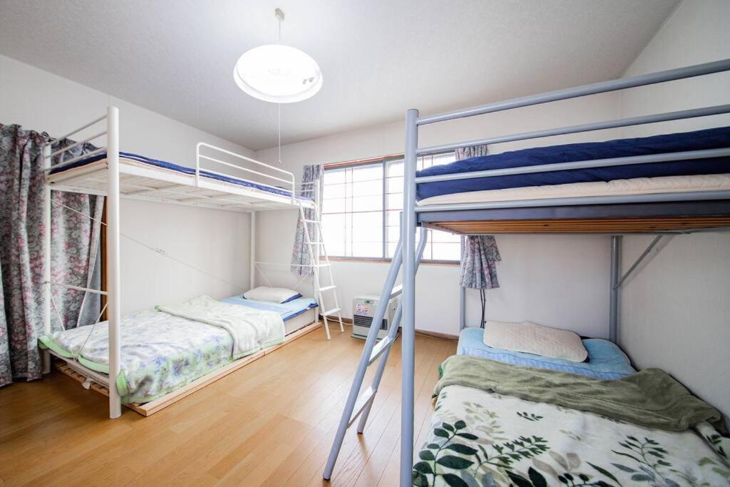Guesthouse Chiyogaoka Асахикава Экстерьер фото