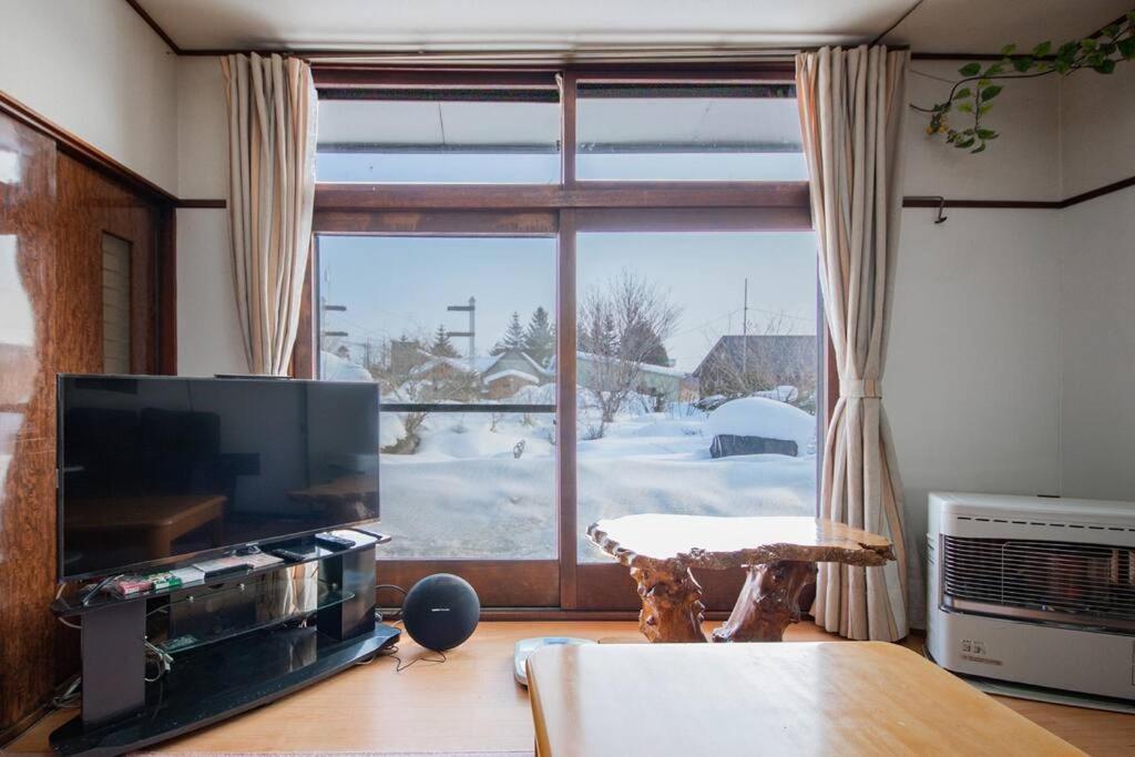 Guesthouse Chiyogaoka Асахикава Экстерьер фото
