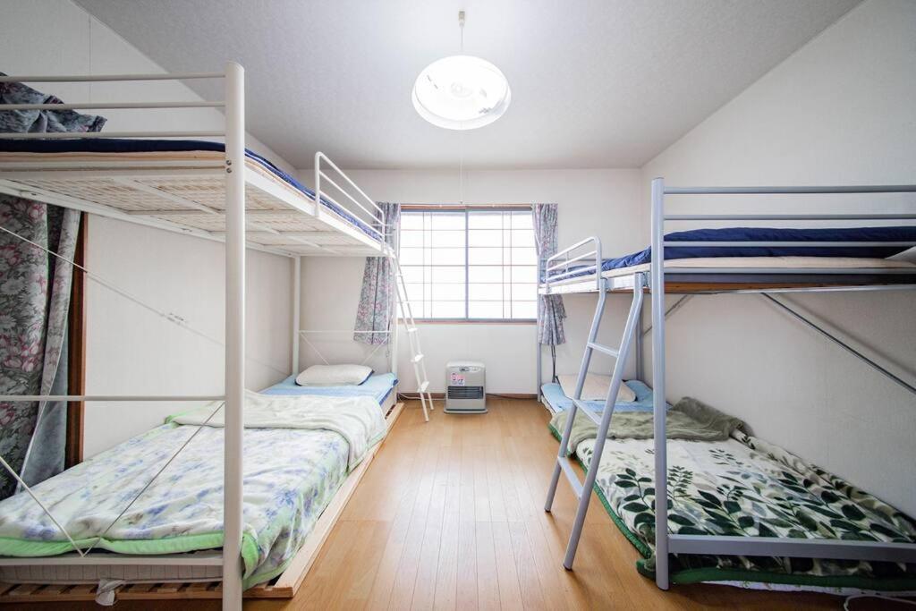 Guesthouse Chiyogaoka Асахикава Экстерьер фото